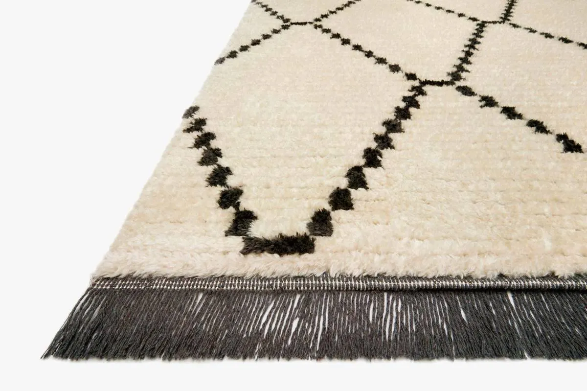 Remi Tan / Black Rug